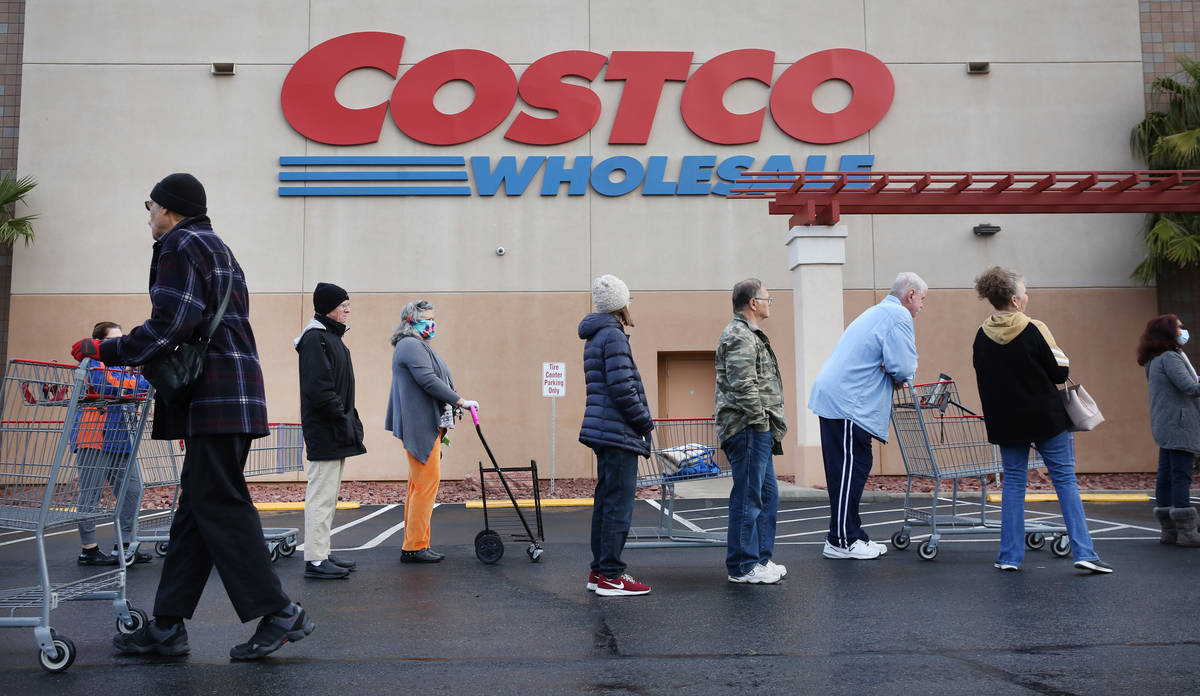 Seniors line up outside Costco on Friday, March 20, 2020, in Henderson. The store reserved earl ...