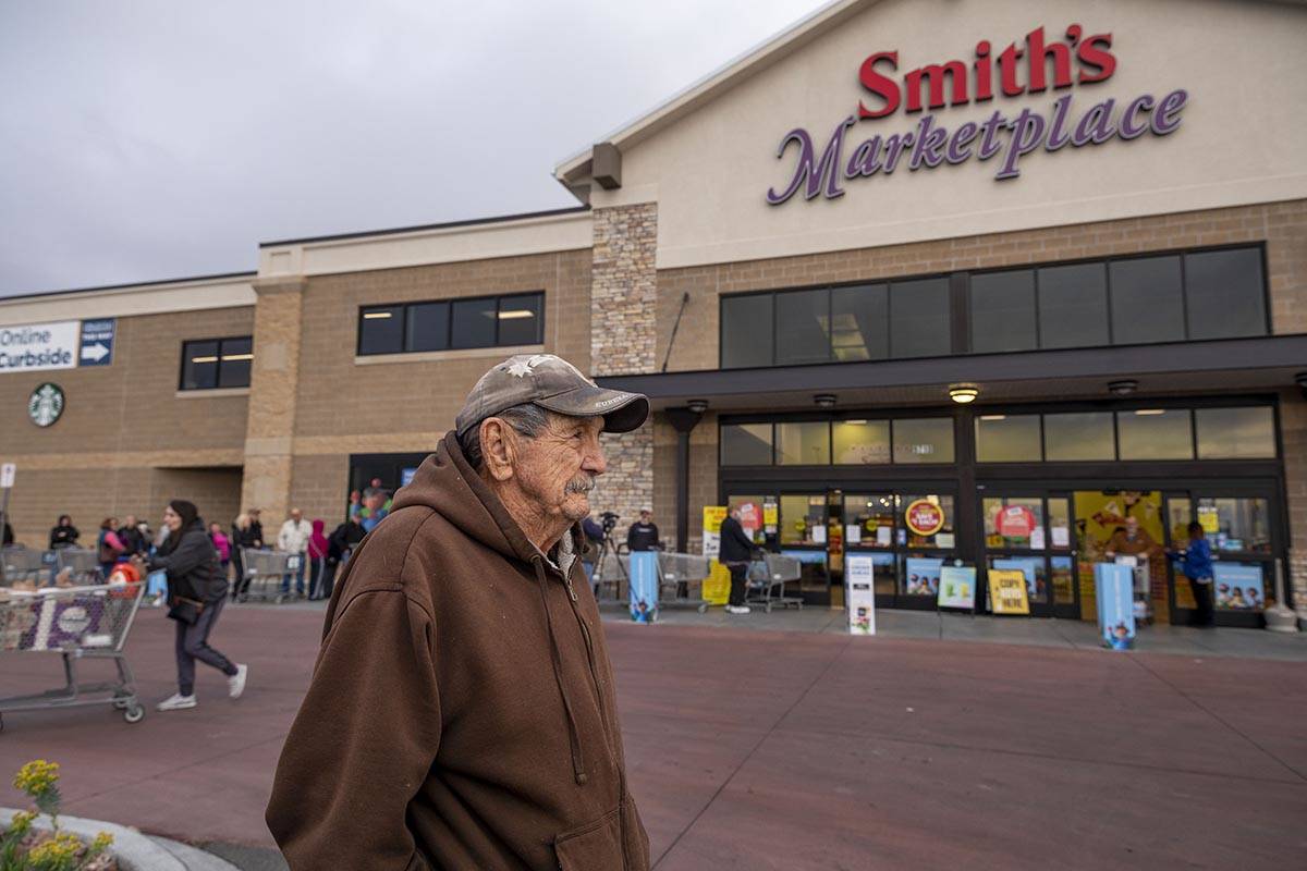 Frank Cienfuegos, 92, of Las Vegas for 70 years, leaves the seniors line outside of a Smith's M ...