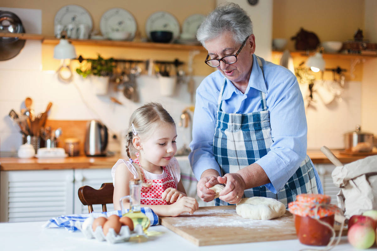 Families can cook together during this stay-at-home time. (Getty Images)