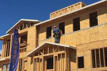 Townhomes are under construction in Las Vegas' Summerlin community on Tuesday, March 17, 2020. ...