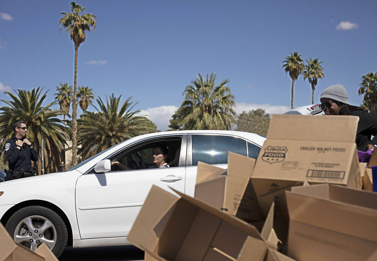 A drive through pick up option was available for those in need at a food bank hosted by The Jus ...