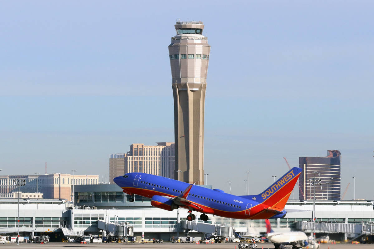 The air traffic control tower at Las Vegas' McCarran International Airport is seen as a Southwe ...