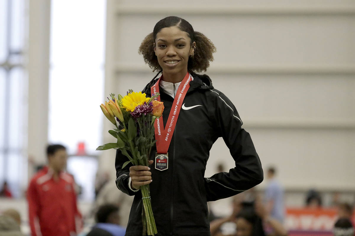 Vashti Cunningham poses for photographers after winning the women's high jump final at the USA ...