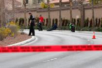 Police investigate a fatal motorcycle accident near the intersection of Tenaya Way and Robindal ...