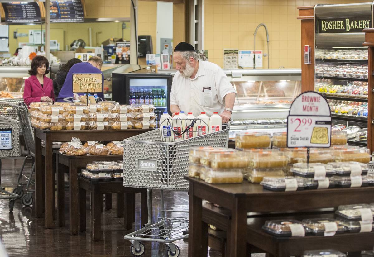 Customers shop in the Kosher Experience section at Smith's at 2211 N. Rampart Blvd. (Benjamin H ...