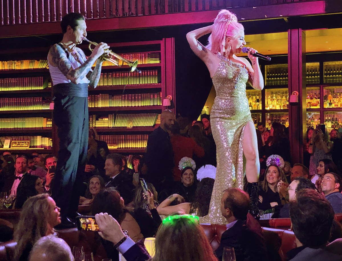 Brian Newman and Lady Gaga perform at NoMad Restaurant at Park MGM on the Las Vegas Strip on Ne ...
