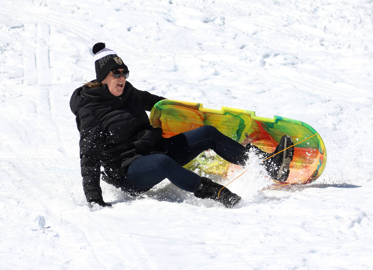 Heather Skovgard of Las Vegas sleds down a hill at Lee Canyon on Tuesday, March 24, 2020. (Bizu ...