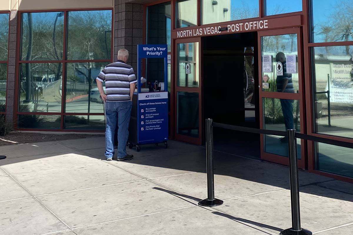 A customers at the U.S. Post Office, 1414 E. Lake Mead Blvd. in North Las Vegas, is greeted Tue ...