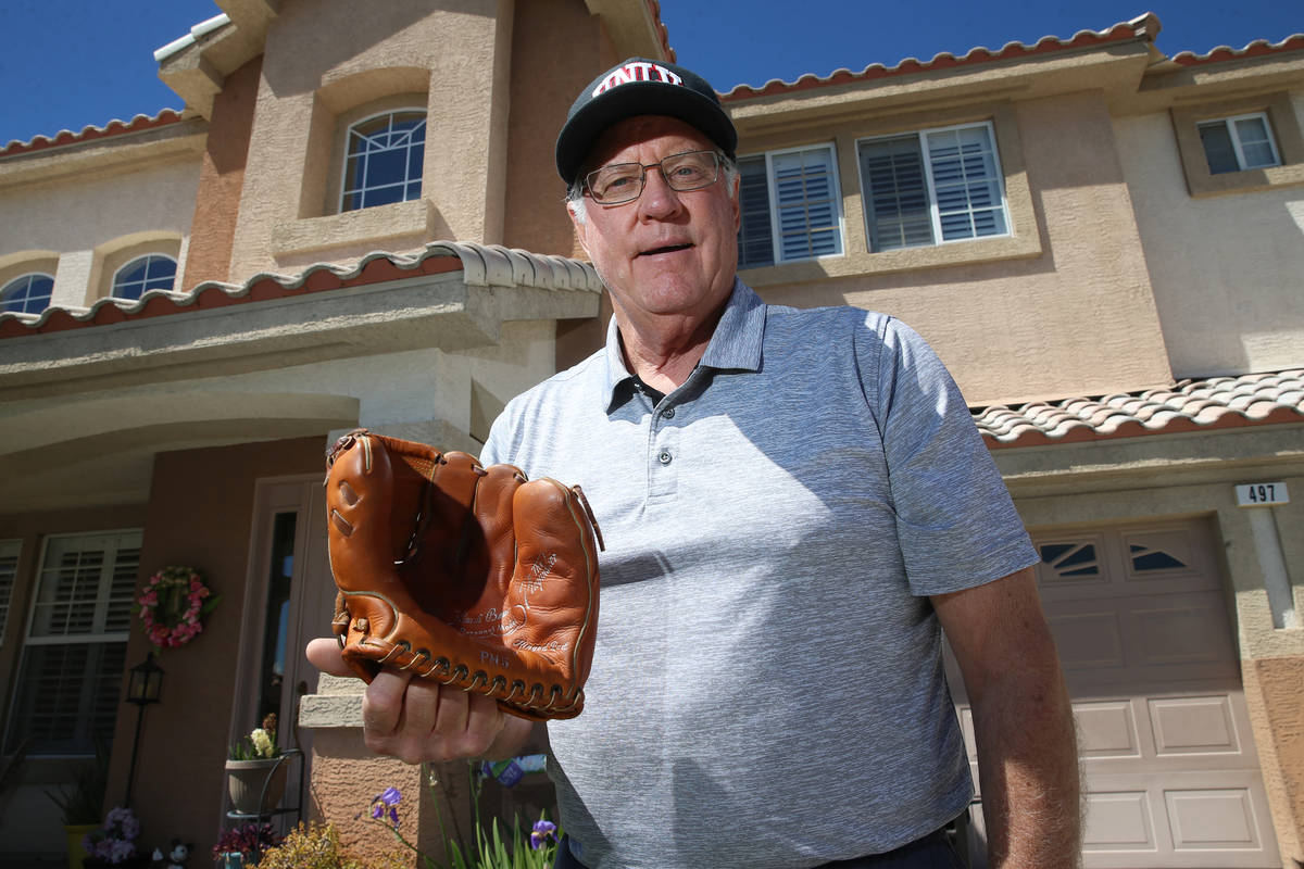 Mike Guerra is photographed with his Hank Bauer model glove at his Las Vegas home, Tuesday, Mar ...