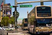 Several RTC buses pass the New York-New York driving down the Strip on Tuesday, Aug. 13, 2019 i ...