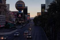 The sun sets on the nearly empty Strip on Tuesday, March 24, 2020, in Las Vegas. (Ellen Schmidt ...