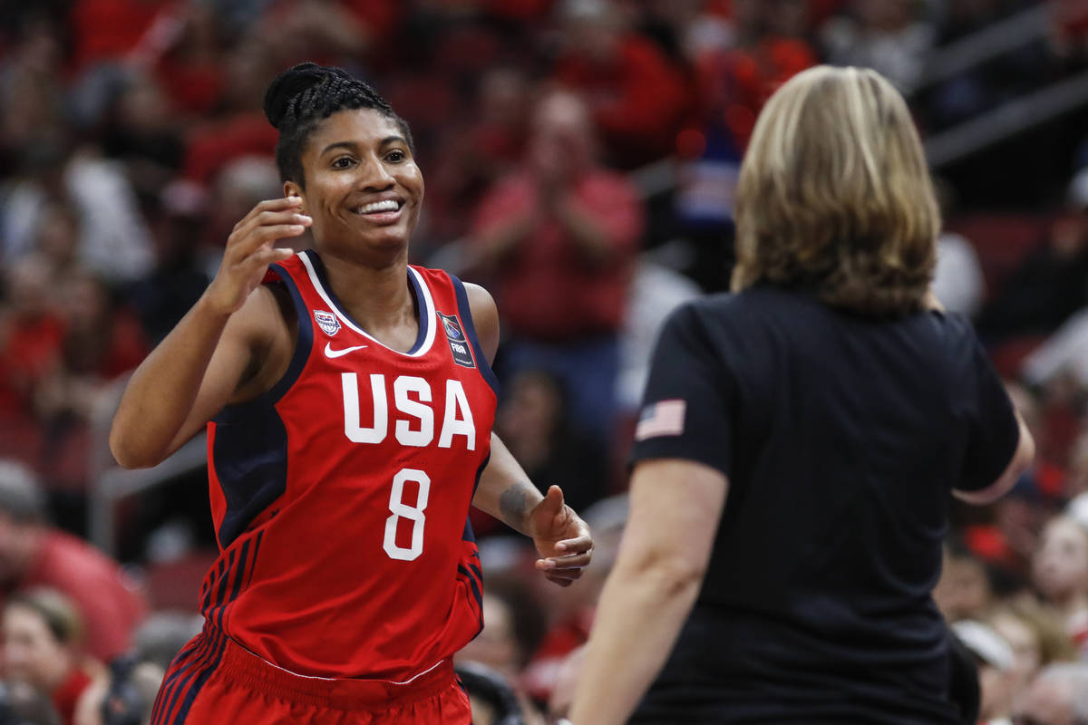 USA Women's National Team forward Angel McCoughtry (8) smiles a she comes off the court during ...