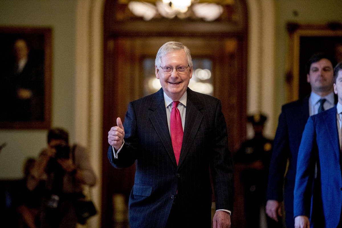 Senate Majority Leader Mitch McConnell gives a thumbs up as he leaves the Senate chamber on Cap ...