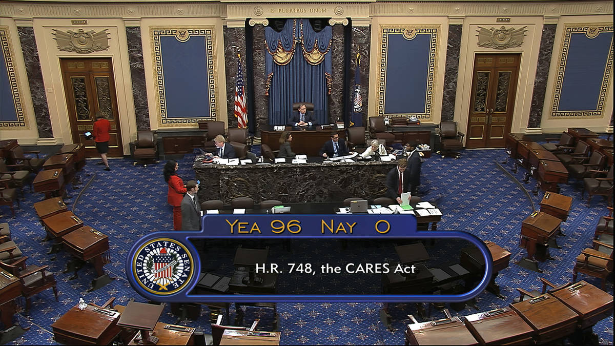 In this image from video, the final vote of 96-0 shows passage of the $2.2 trillion economic re ...