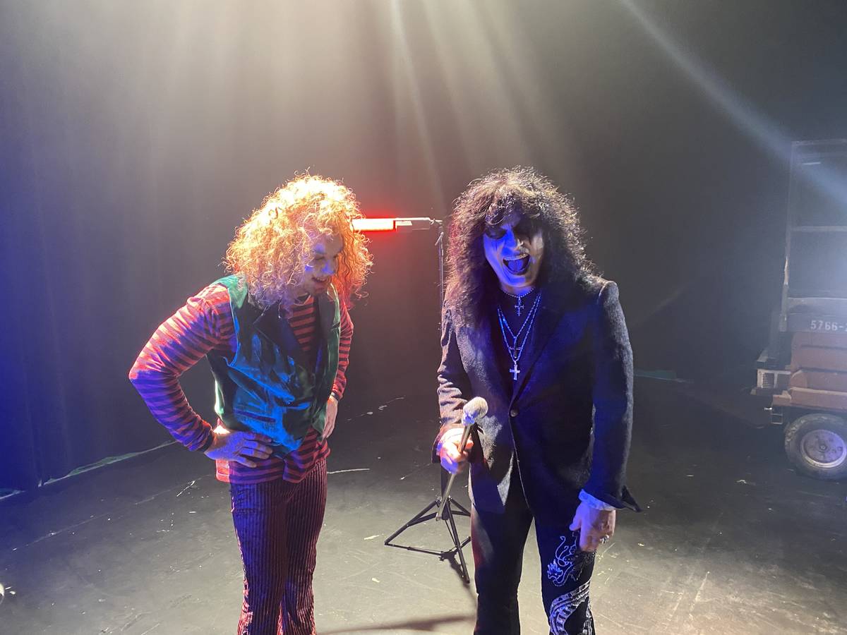 Carrot Top and Paul Shortino are shown recording a heavy metal version of "Send In The Clowns" ...