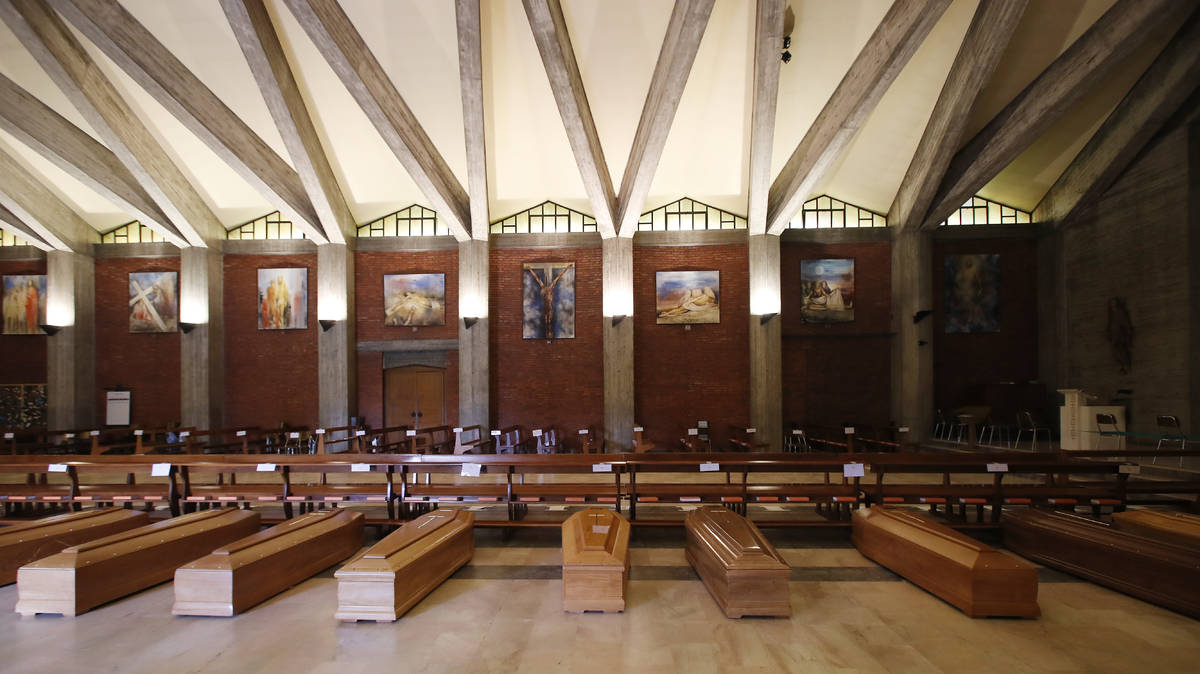 Coffins are lined up on the floor in the San Giuseppe church in Seriate, one of the areas worst ...