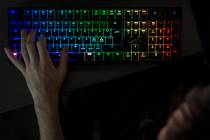 Rogue team member Casper Møller practices Counter-Strike: Global Offensive with players from a ...