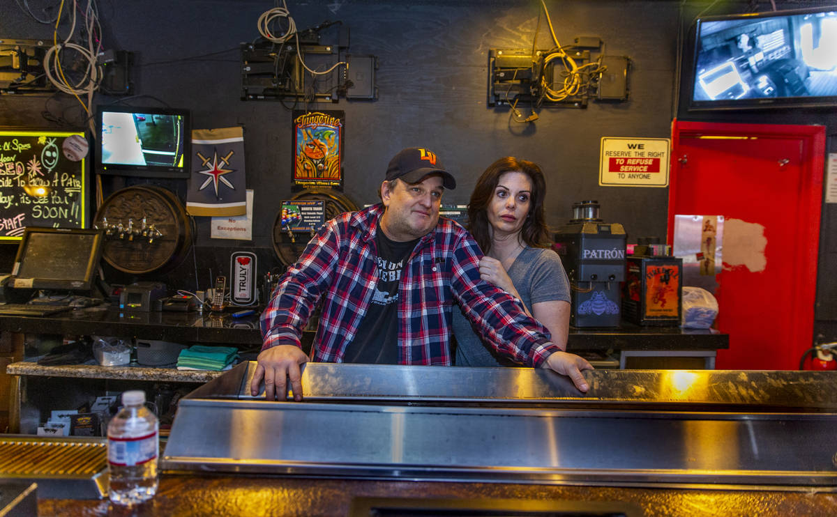 Saddle N Spurs Saloon owners Bobby and Melissa Kingston behind their bar as they close up for t ...