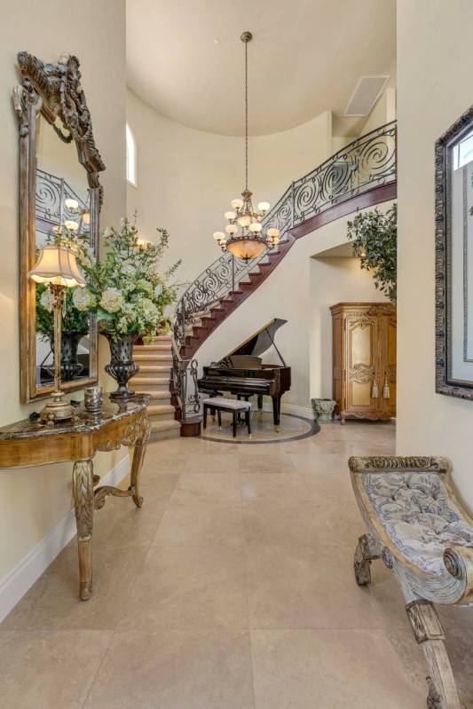 Rare, imported Turkish travertine flooring flows throughout the main living area. (Red Luxury R ...