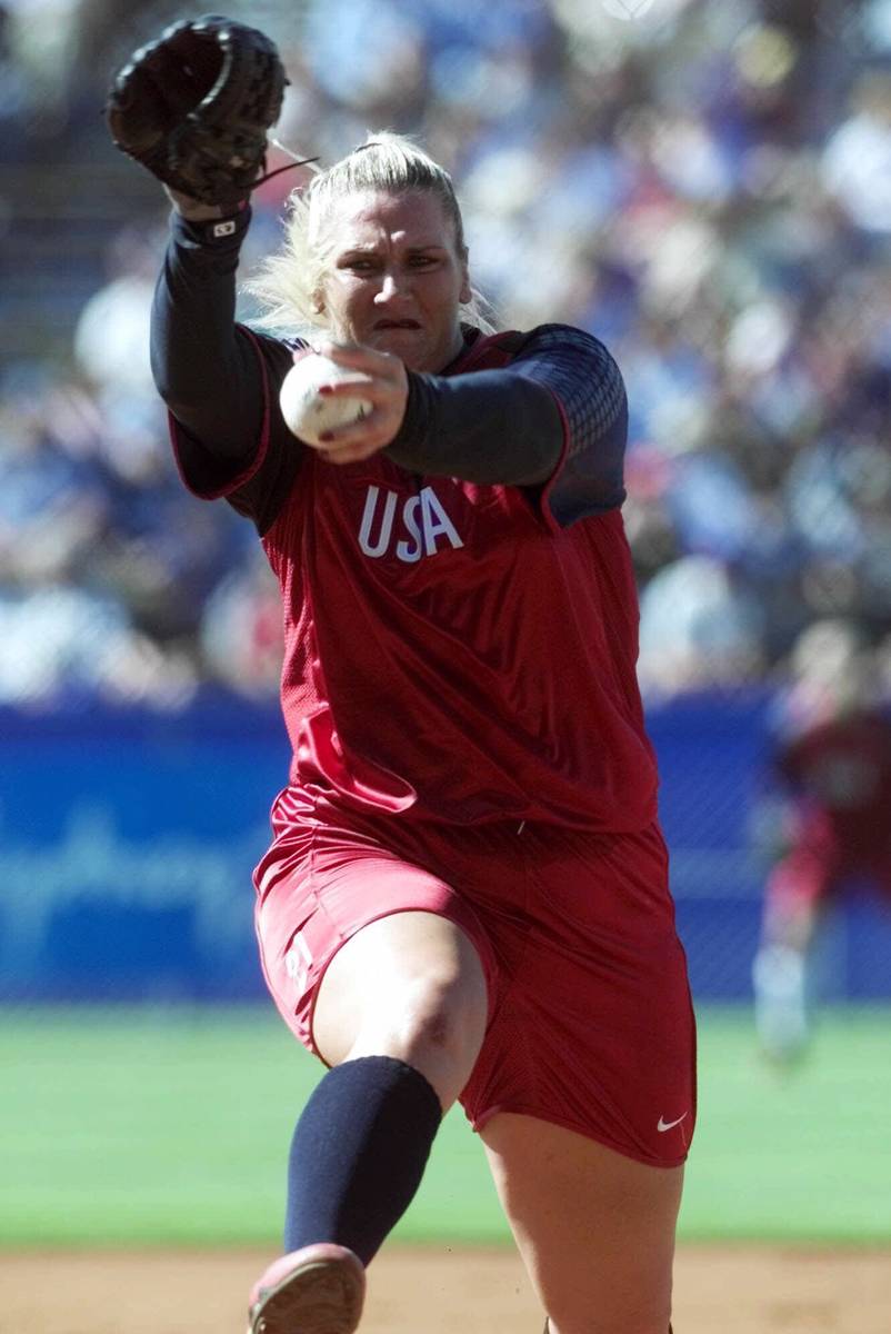 The United States pitcher Lori Harrigan hurls a pitch on her way to a no-hitter against Canada ...