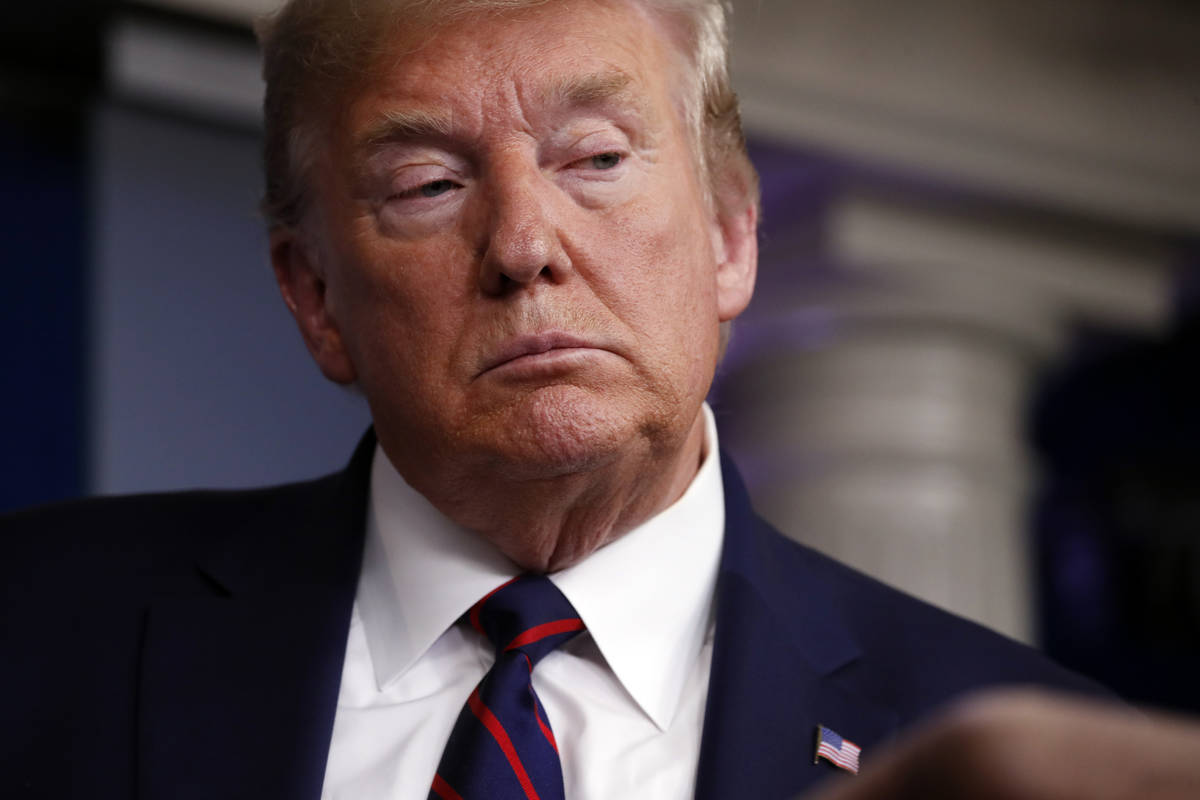 President Donald Trump listens to a question as he speaks about the coronavirus in the James Br ...