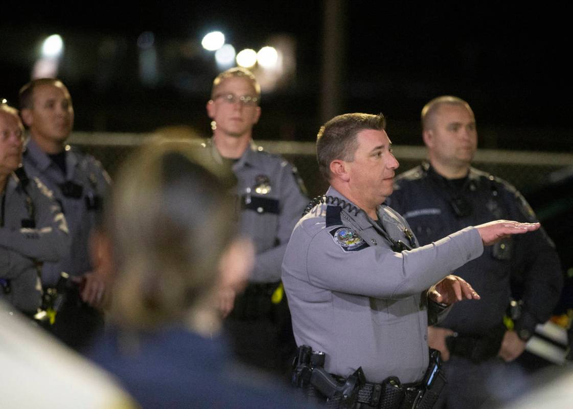 Members of law enforcement meet before starting the procession for Nevada Highway Patrol Sgt. B ...