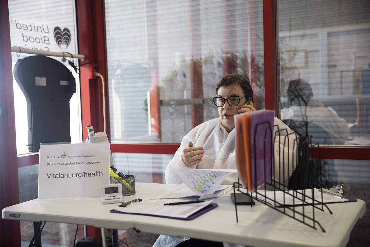 Joan Young, a donor relations specialist, speaks on the phone with a donor at Vitalant, a nonpr ...