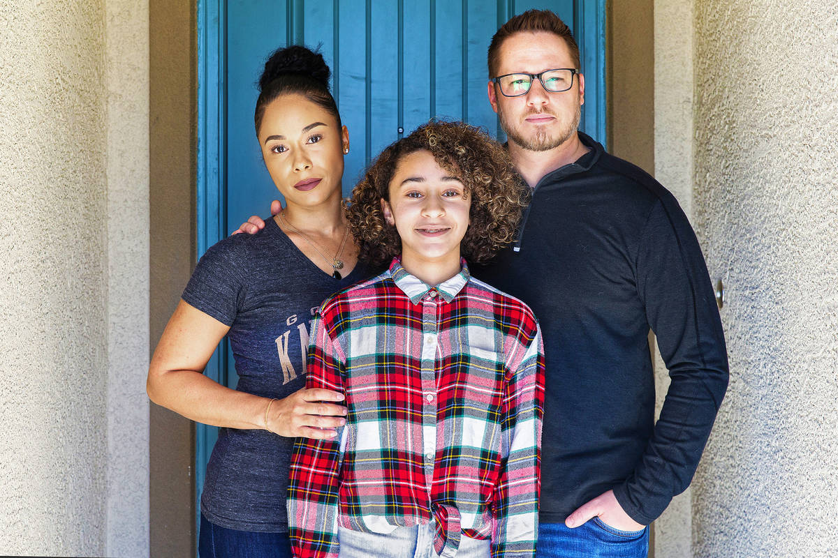 Jason and Erika Reed, with daughter Madison at their home in North Las Vegas on Tuesday, March ...