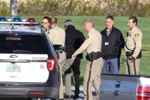 Las Vegas homicide detectives investigate a report of a body at Silverado Ranch Park on Thursda ...