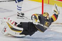 Vegas Golden Knights goaltender Marc-Andre Fleury makes a diving save in the third period durin ...