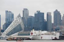 The Navy hospital ship USNS Comfort docks in New York, Monday, March 30, 2020. The ship has 1,0 ...