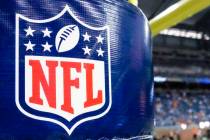 FILE - This Aug. 9, 2014 file photo shows an NFL logo on a goal post pad before a preseason NFL ...