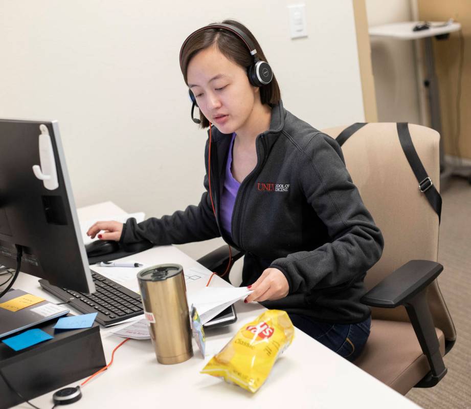 Second-year UNLV medical student Elli Tian asks about a potential coronavirus patient's symptom ...