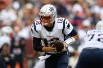 New England Patriots quarterback Tom Brady (12) during the second half of an NFL football game ...