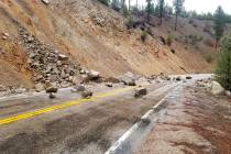 This photo provided by Tyler Beyer shows a rockslide on Highway 21 near Lowman, Idaho, after a ...