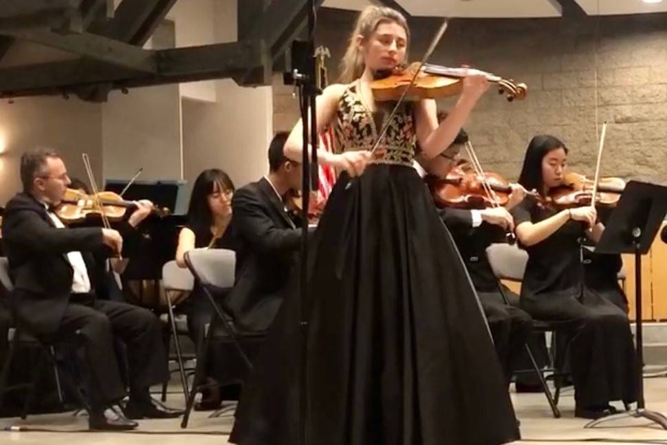 Lourdes Pinney, 16, of Henderson performs with an orchestra. She's among 115 musicians, ages 16 ...