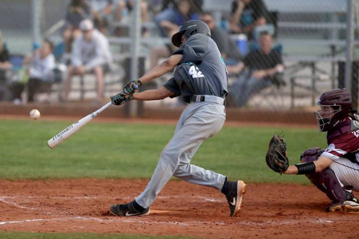 Silverado's Caleb Hubbard (42) hits against Cimarron-Memorial in the fourth inning of their bas ...