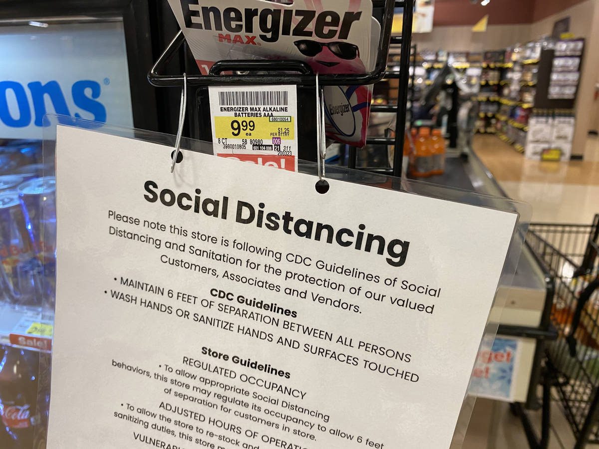 Social distancing information at Albertsons at 1650 N. Buffalo Dr. in Las Vegas Tuesday, March ...