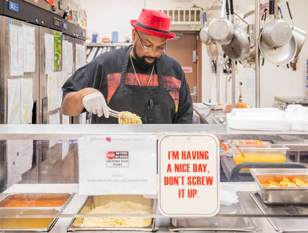 Chef Lester Johnson prepares meals at Martin Luther King Jr. Senior Center that is closed down ...