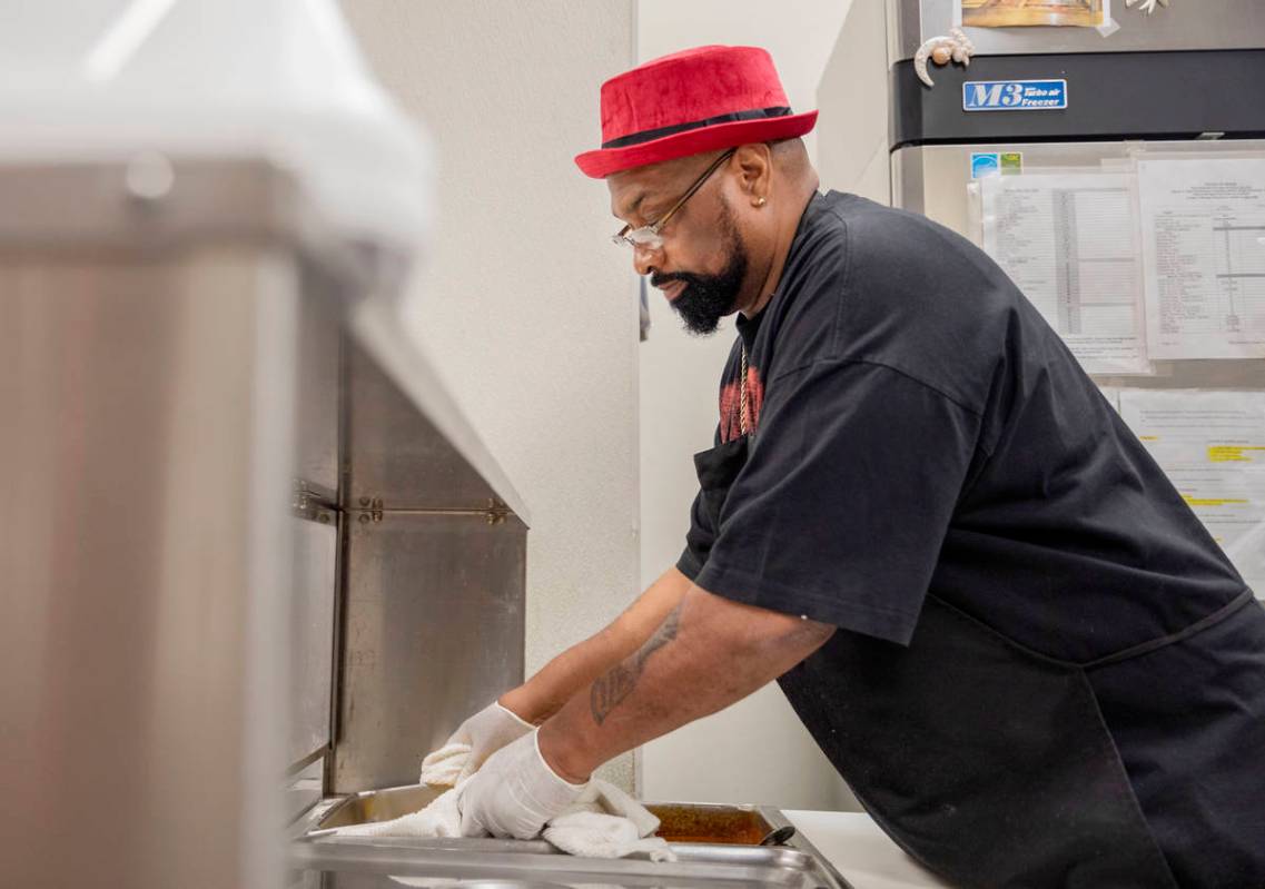 Chef Lester Johnson prepares meals at Martin Luther King Jr. Senior Center that is closed down ...