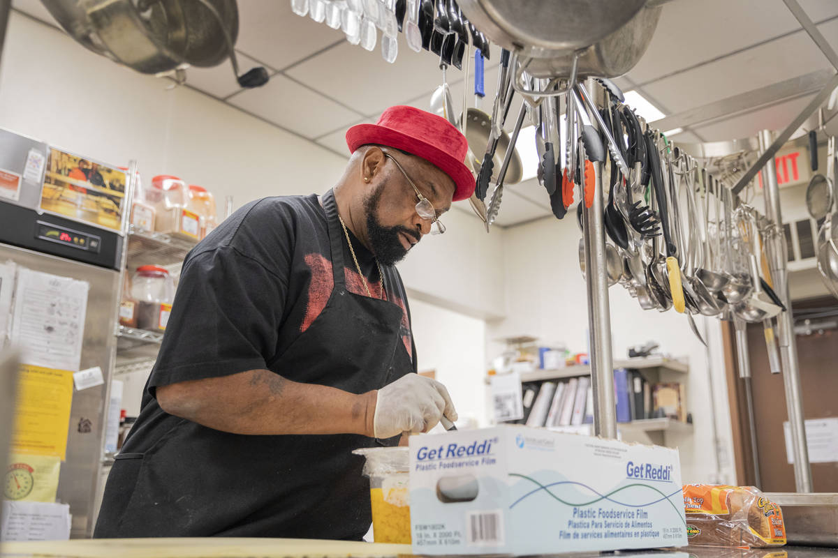 Chef Lester Johnson prepares meals at Martin Luther King Jr. Senior Center that is closed down ...