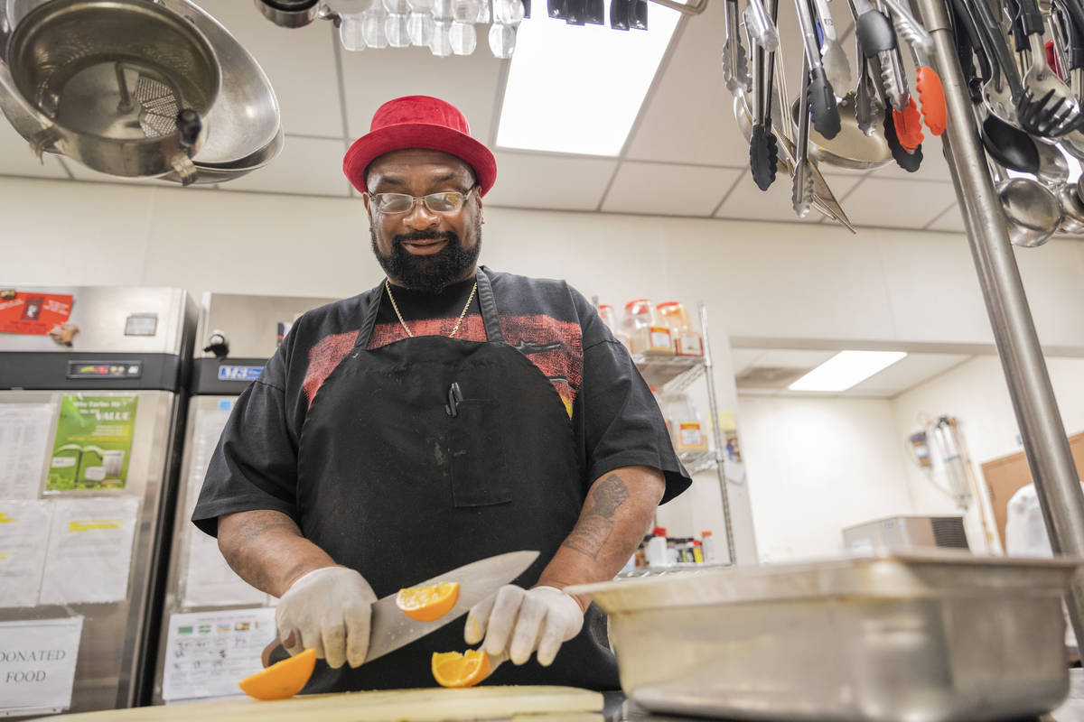 Chef Lester Johnson prepares meals at Martin Luther King Jr. Senior Center that is closed down ...