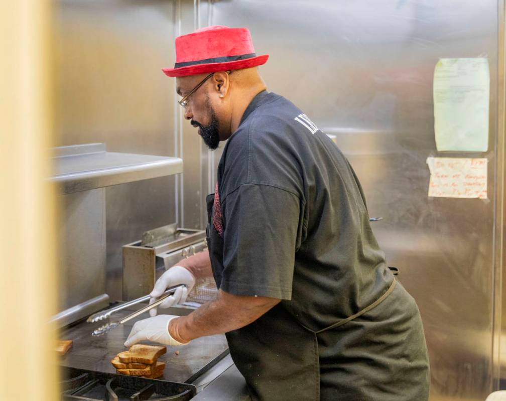 Chef Lester Johnson prepares meals at Martin Luther King Jr. Senior Center that is closed down ...