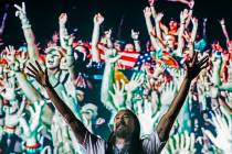 Steve Aoki pumps up the crowd during his performs at the Circuit Grounds stage on day three of ...