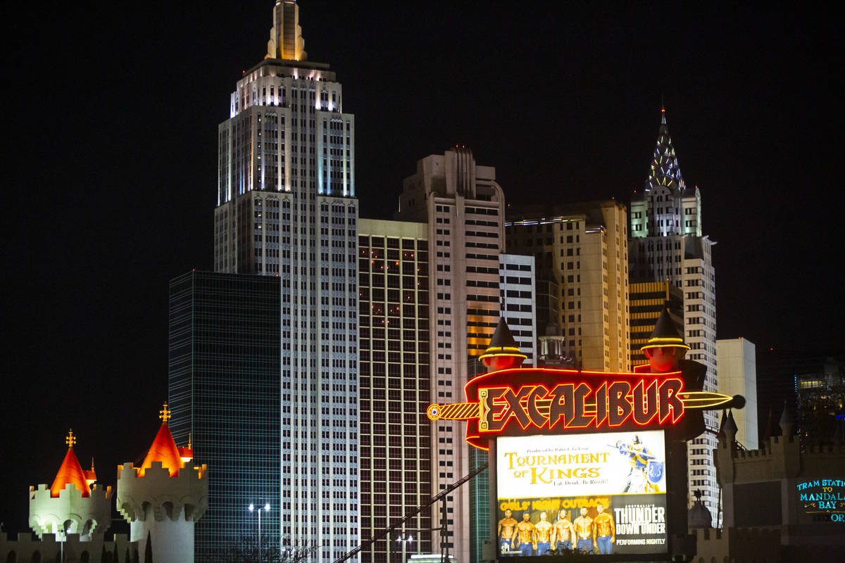 Lights through room windows are displayed at the New York-New York along the Las Vegas Strip on ...
