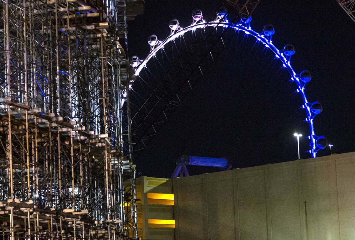 The High Roller is lit blue in memory of Nevada Highway Patrol Sgt. Benjamin Jenkins in Las Veg ...