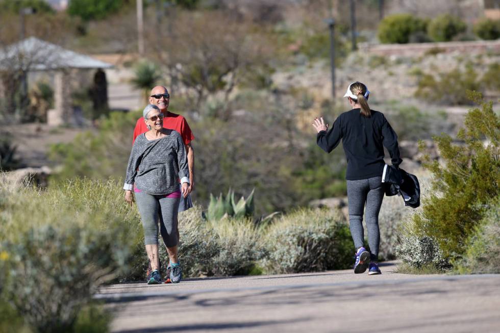 Stan and Mary Jane Antrim, left, smile at Lois Widell, all of Las Vegas, at Hualapai Canyon hik ...