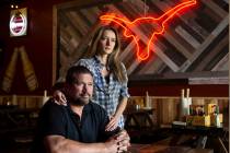 Brian Buechner, left, and wife Natalia Badzjo, owners of Big B's Texas BBQ, on Thursday, March ...