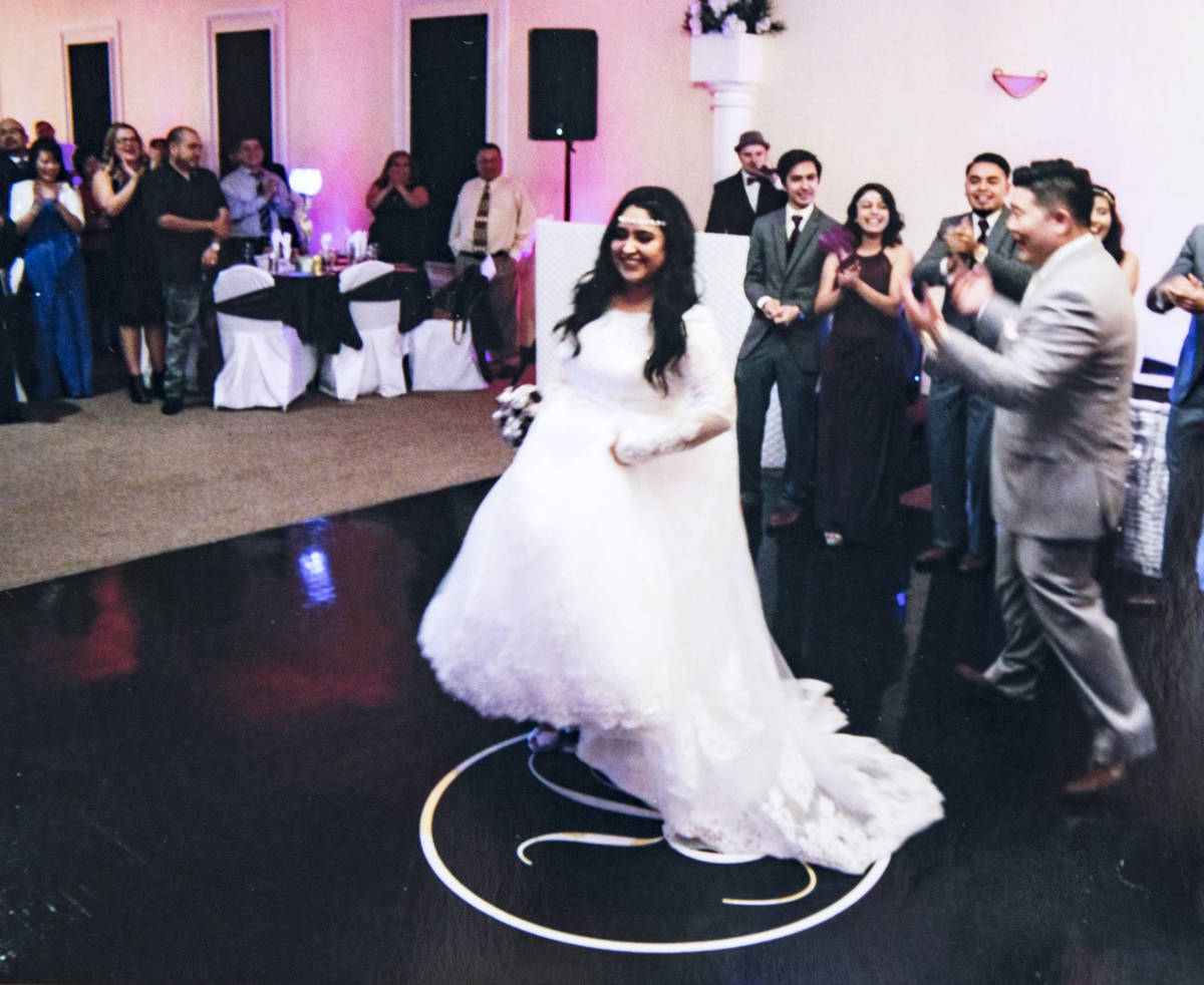 A photo of the wedding of Corey Huh and his wife Adriana Huh in 2016. Adriana is in serious con ...