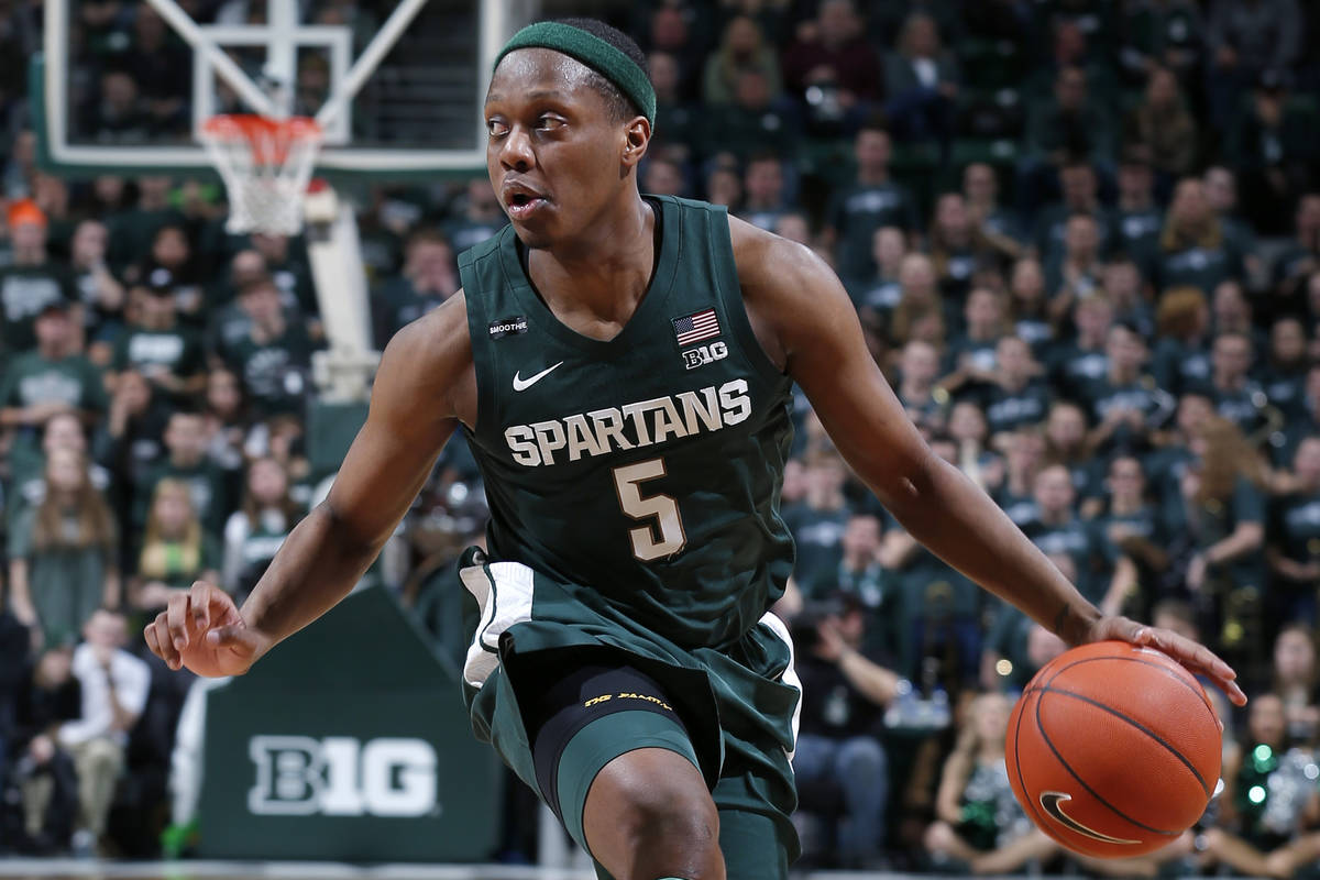 In this Feb. 4, 2020, file photo, Michigan State's Cassius Winston drives against Penn State du ...